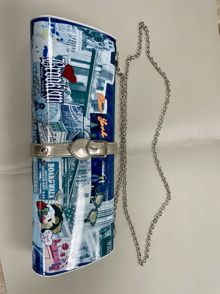MAGAZINE CLUTCH WITH STRAP