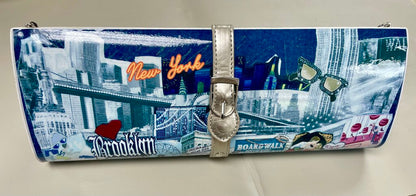 MAGAZINE CLUTCH WITH STRAP