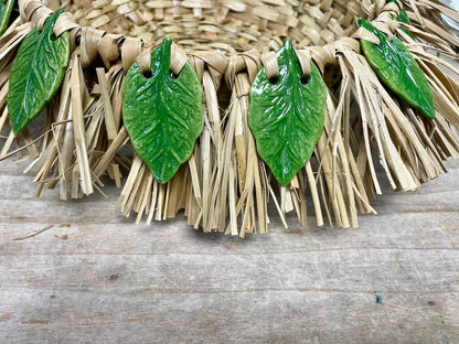 HAND WOVEN BASKET WITH CERAMIC LEAFS