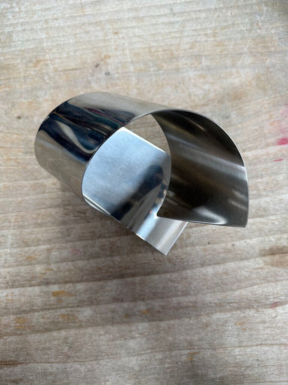 MODERNIST STAINLESS STEEL WINE CRADLE