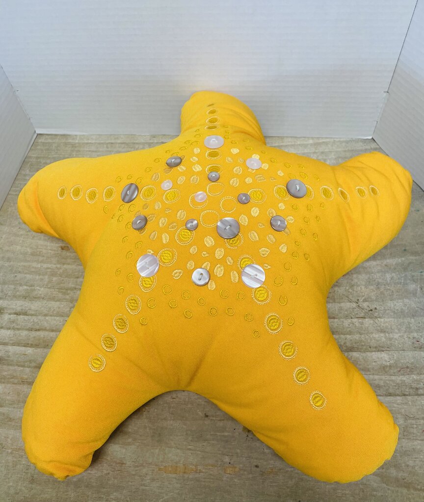 STAR SHAPED YELLOW EMBROIDERED PILLOW
