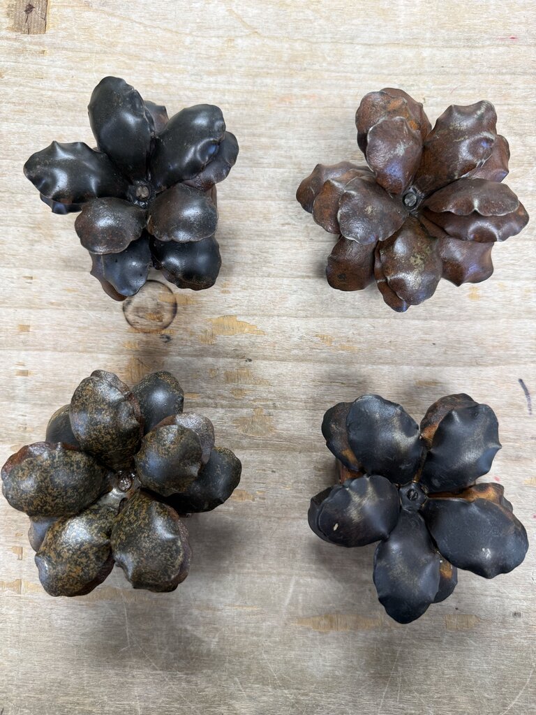 JAN BARBOGLIO HAND WORKED IRON FLOWER NAPKIN RINGS SET OF 4
