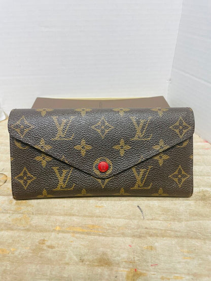 LOUIS VUITTON WALLET RED BUTTON