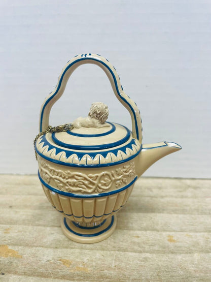CANEWARE MINI TEA POT W/ LION