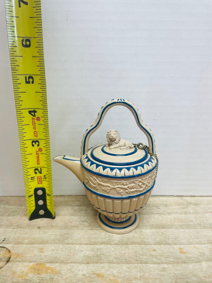 CANEWARE MINI TEA POT W/ LION